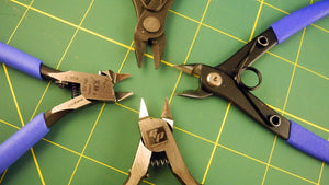 Nippers, sandpapir m.m logo