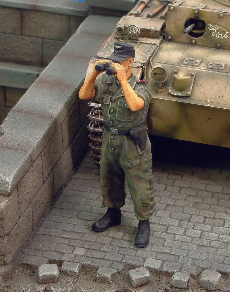 Waffen SS tanker looking through binoculars-WWII